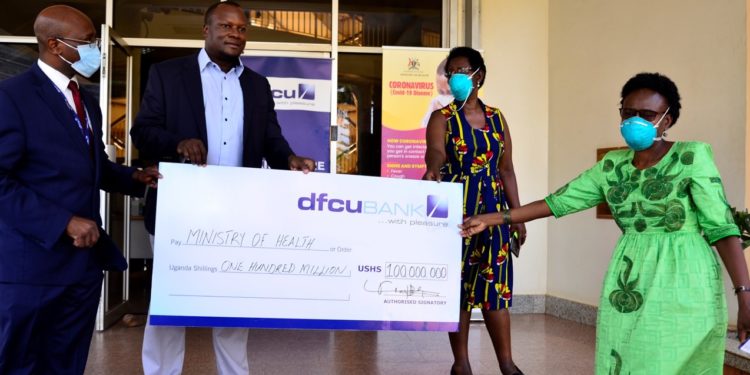 Dfcu Bank Contributes Shs70m Cash, Sanitation Items Worth Shs30m To  COVID-19 Fight
