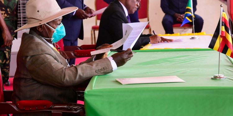 Museveni signs Oil pipeline deal with Tanzania after Frenchmen protecting their rights